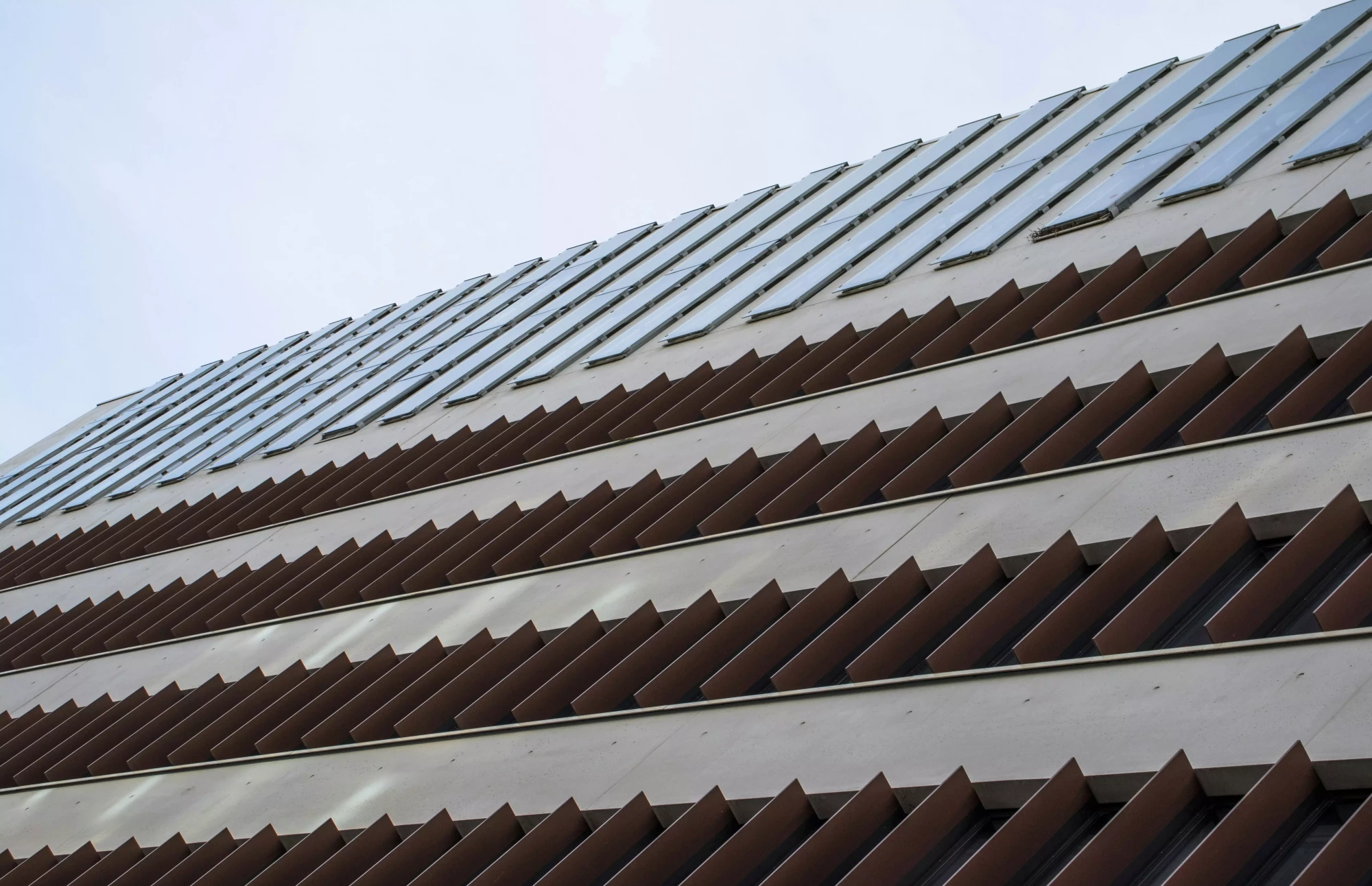 Modern house with solar panels and renovated roof in a quiet Lyon suburb demonstrating energy efficiency